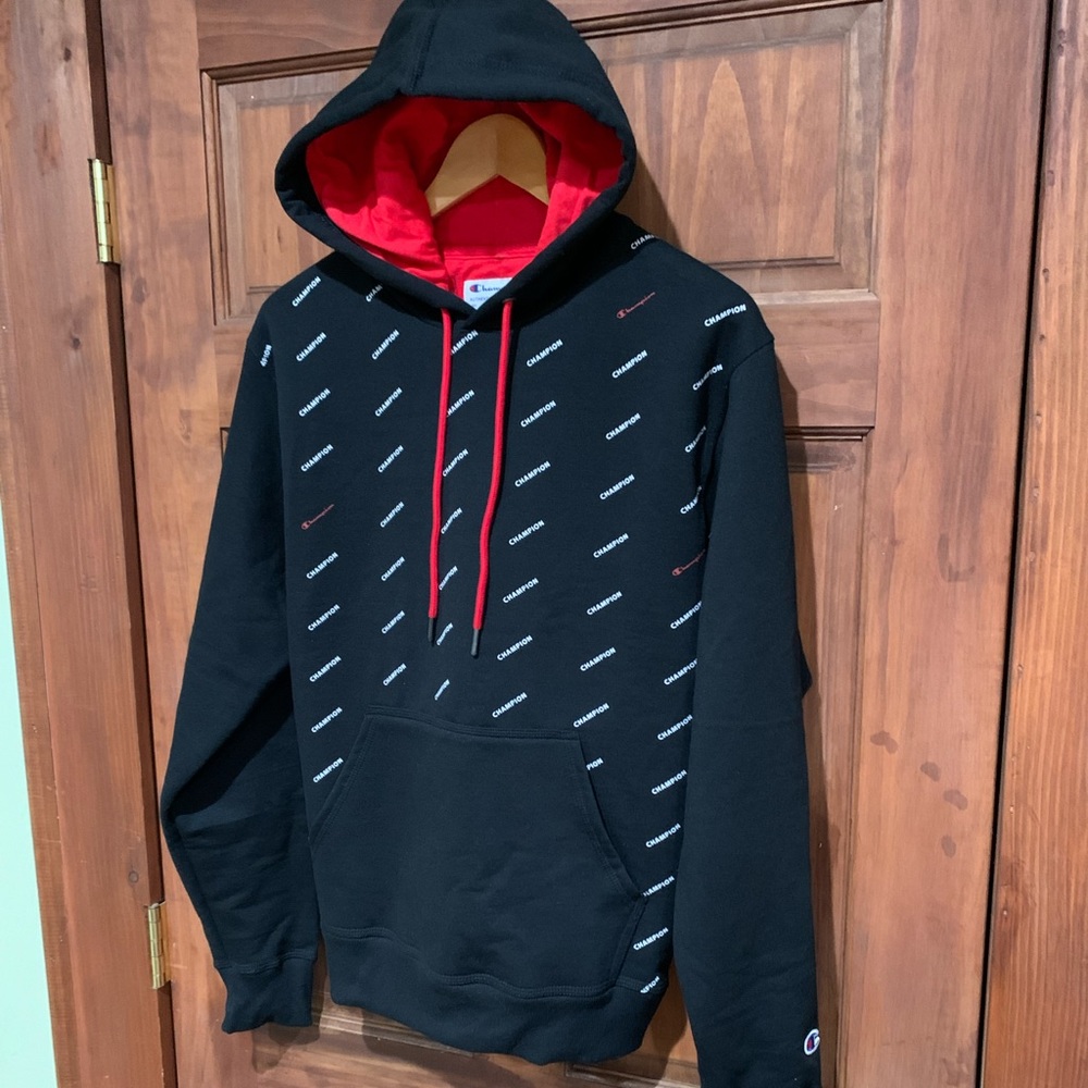 New Champion mens hoodie with tags, size S.